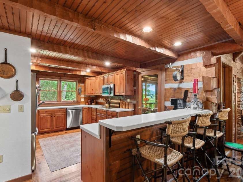 65 Sugar Maple Drive, Mills River, NC 28759.  MLS# CAR4357301, YatesRealty ID 18562. The kitchen is functional & friendly - iit is open to the living space & allows the chef to feel attached to the action!