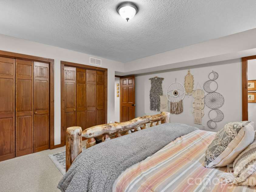 65 Sugar Maple Drive, Mills River, NC 28759.  MLS# CAR4357301, YatesRealty ID 18562. This home is filled with ample storage. Bedroom #2 has double closets.