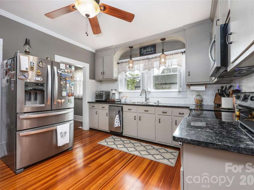 271 Main Street, Denton, NC 27239.  MLS# CAR4404890, YatesRealty ID 18566. Kitchen with hardwood floors