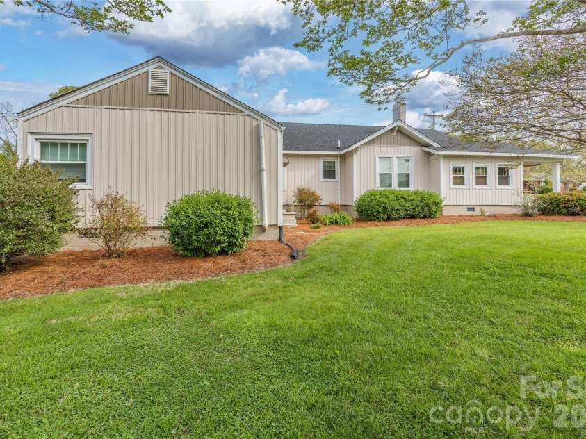 271 Main Street, Denton, NC 27239.  MLS# CAR4404890, YatesRealty ID 18566. Side yard