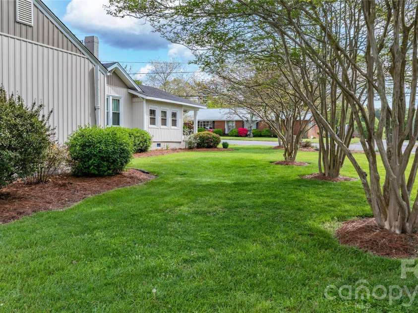271 Main Street, Denton, NC 27239.  MLS# CAR4404890, YatesRealty ID 18566. Side yard