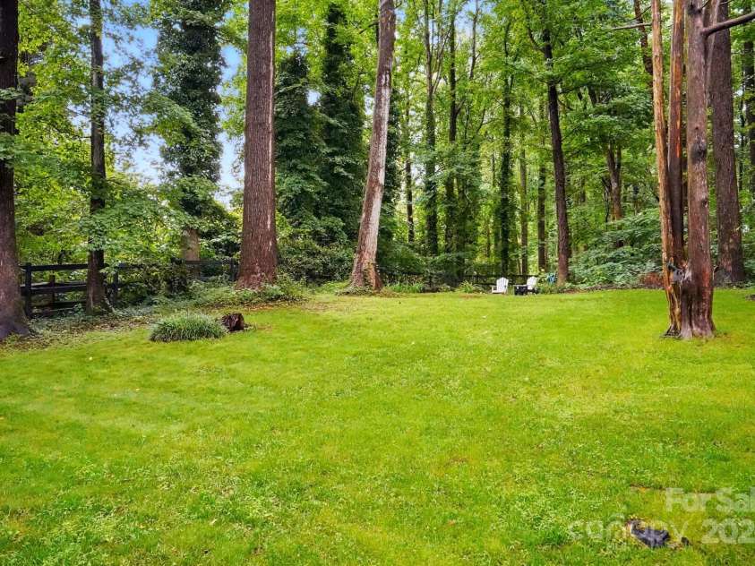 8708 Piccone Brook Lane, Charlotte, NC 28216.  MLS# CAR4267113, YatesRealty ID 18568. Large 1/2 acre fenced-in  lot