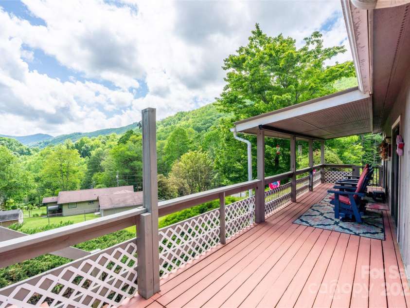 131 Apple Blossom Lane, Maggie Valley, NC 28751.  MLS# CAR4265861, YatesRealty ID 18577. Big Views from the Porch