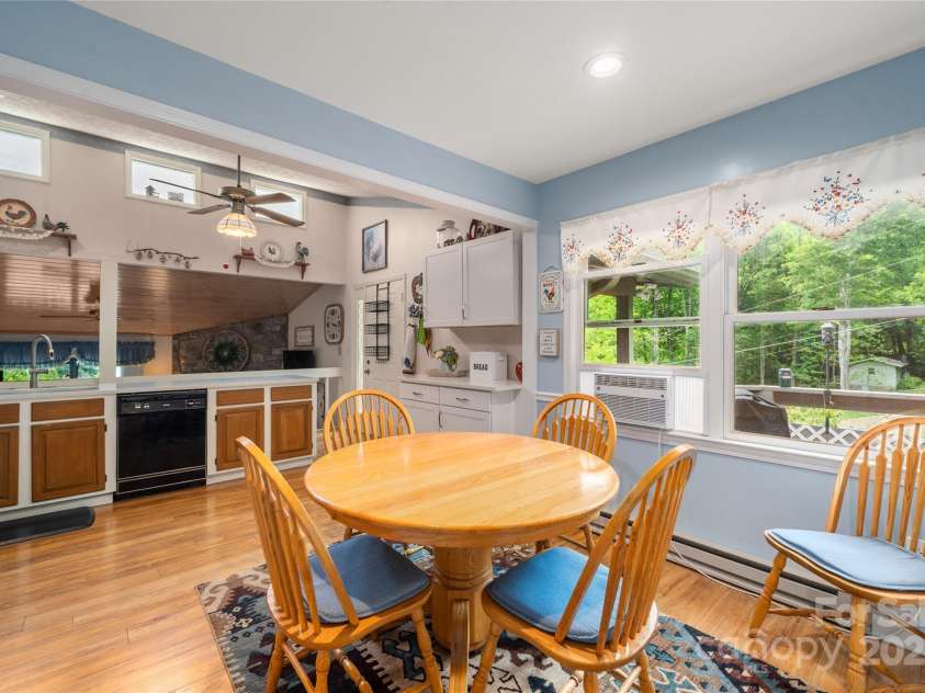 131 Apple Blossom Lane, Maggie Valley, NC 28751.  MLS# CAR4265861, YatesRealty ID 18577. Dining and Kitchen area with coffee bar