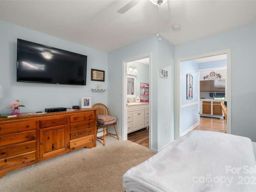 131 Apple Blossom Lane, Maggie Valley, NC 28751.  MLS# CAR4265861, YatesRealty ID 18577. Layout of Primary on main levle near the dining room and private bath