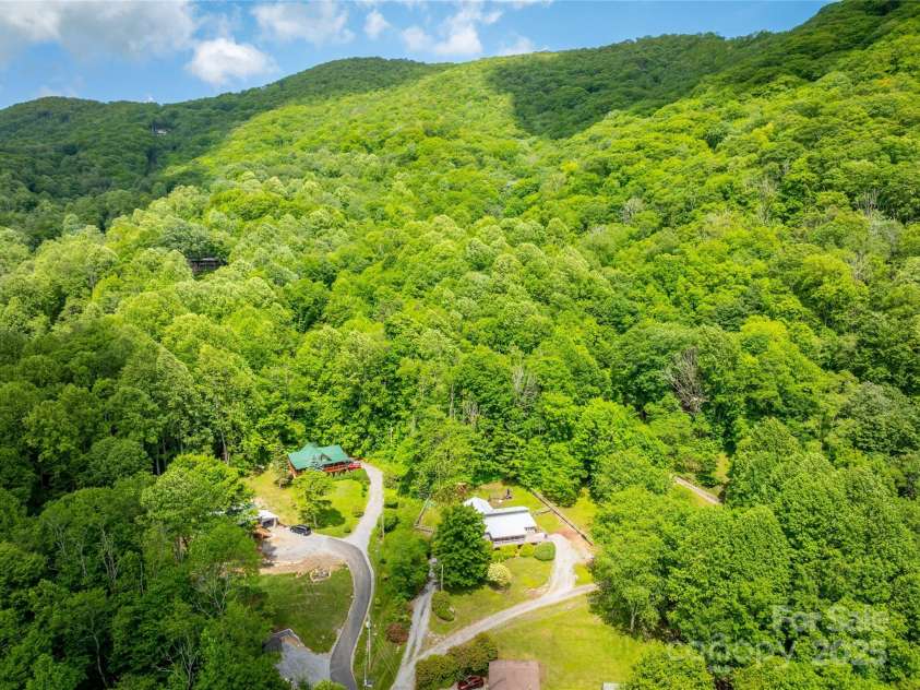 131 Apple Blossom Lane, Maggie Valley, NC 28751.  MLS# CAR4265861, YatesRealty ID 18577. Overview of the two drives to the house