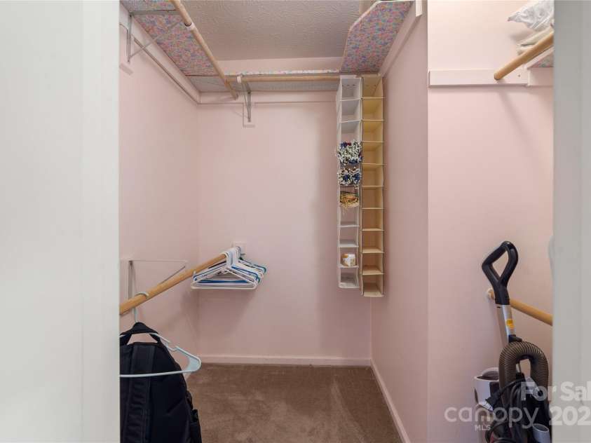 131 Apple Blossom Lane, Maggie Valley, NC 28751.  MLS# CAR4265861, YatesRealty ID 18577. Walk in closet lower primary