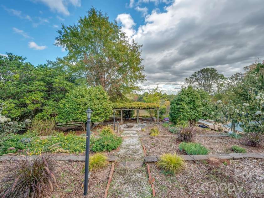 936 Golden Road, Tryon, NC 28782.  MLS# CAR4317970, YatesRealty ID 18582. 
