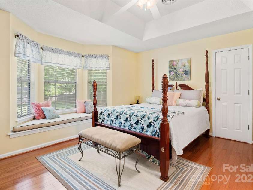 1666 Sam Smith Road, Fort Mill, SC 29708.  MLS# CAR4250464, YatesRealty ID 18586. Generous Primary Suite With Tray Ceiling