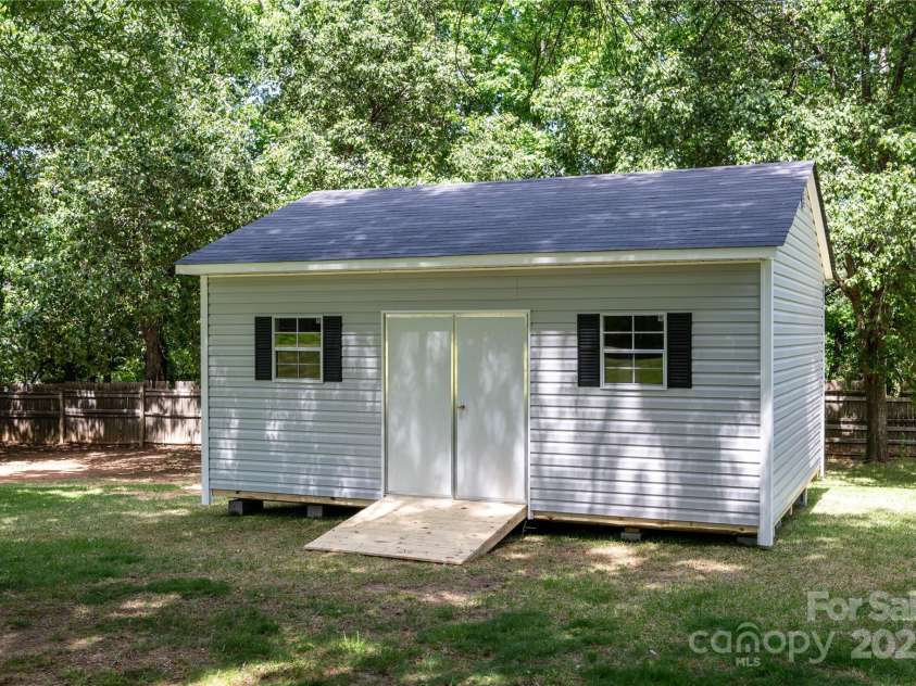 1666 Sam Smith Road, Fort Mill, SC 29708.  MLS# CAR4250464, YatesRealty ID 18586. New Storage Shed - For Sale Separately