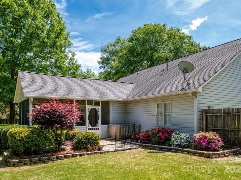1666 Sam Smith Road, Fort Mill, SC 29708.  MLS# CAR4250464, YatesRealty ID 18586. Serene Backyard Landscape