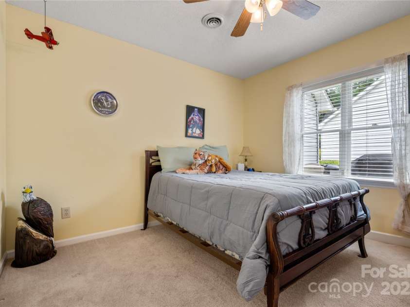 1666 Sam Smith Road, Fort Mill, SC 29708.  MLS# CAR4250464, YatesRealty ID 18586. Spacious Bedroom 3