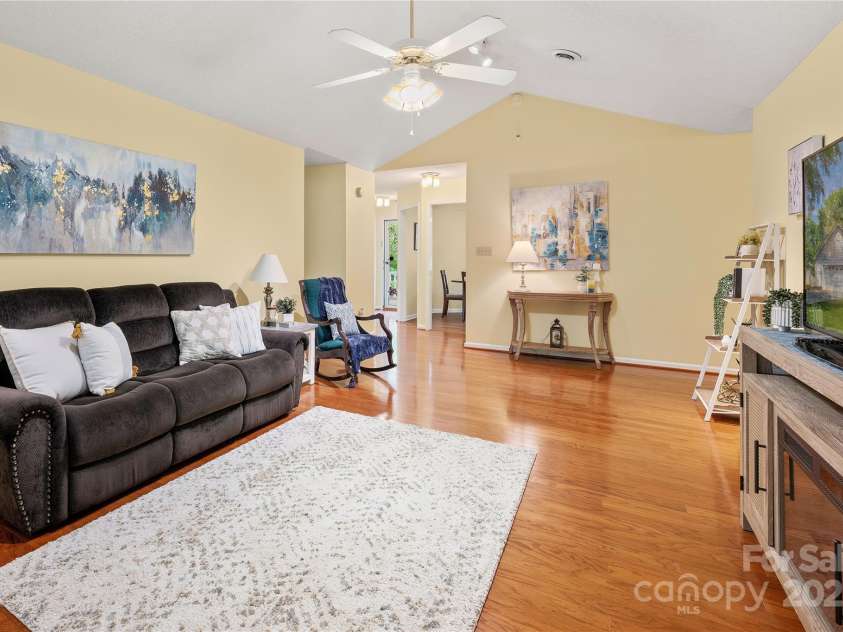1666 Sam Smith Road, Fort Mill, SC 29708.  MLS# CAR4250464, YatesRealty ID 18586. Spacious Living Room w/ hardwoods