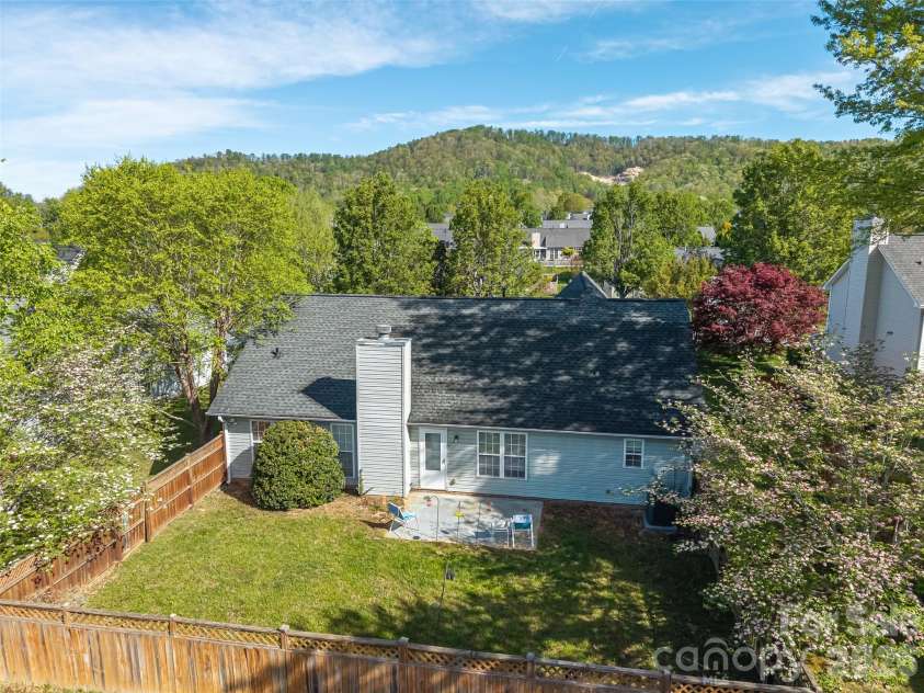 171 Rolling Meadow Road, Fletcher, NC 28732.  MLS# CAR4372180, YatesRealty ID 18589. Back yard/ patio