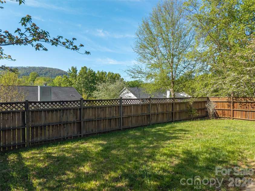 171 Rolling Meadow Road, Fletcher, NC 28732.  MLS# CAR4372180, YatesRealty ID 18589. Fenced back yard