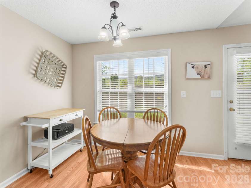 171 Rolling Meadow Road, Fletcher, NC 28732.  MLS# CAR4372180, YatesRealty ID 18589. Kitchen with eat in