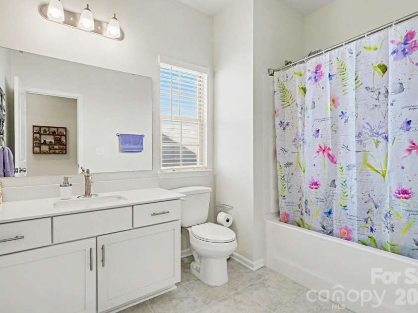 2343 Mount Harmony Church Road, Matthews, NC 28104.  MLS# CAR4360217, YatesRealty ID 18591. Hall bathroom