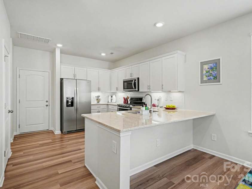 2343 Mount Harmony Church Road, Matthews, NC 28104.  MLS# CAR4360217, YatesRealty ID 18591. Large island