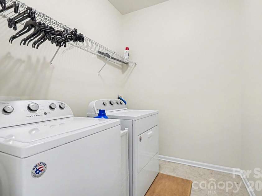 2343 Mount Harmony Church Road, Matthews, NC 28104.  MLS# CAR4360217, YatesRealty ID 18591. Laundry area upstairs