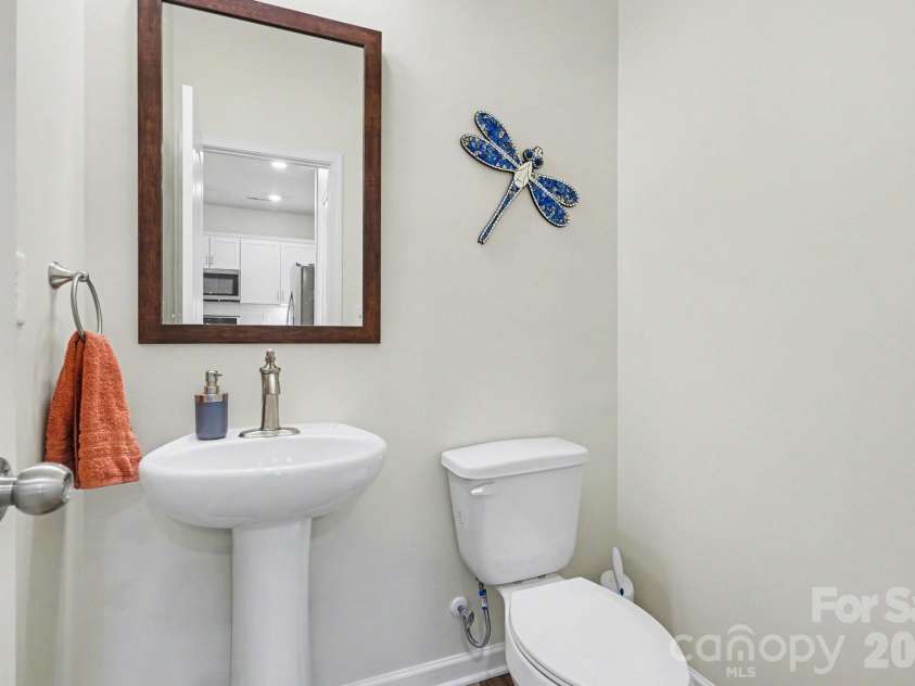 2343 Mount Harmony Church Road, Matthews, NC 28104.  MLS# CAR4360217, YatesRealty ID 18591. Powder room
