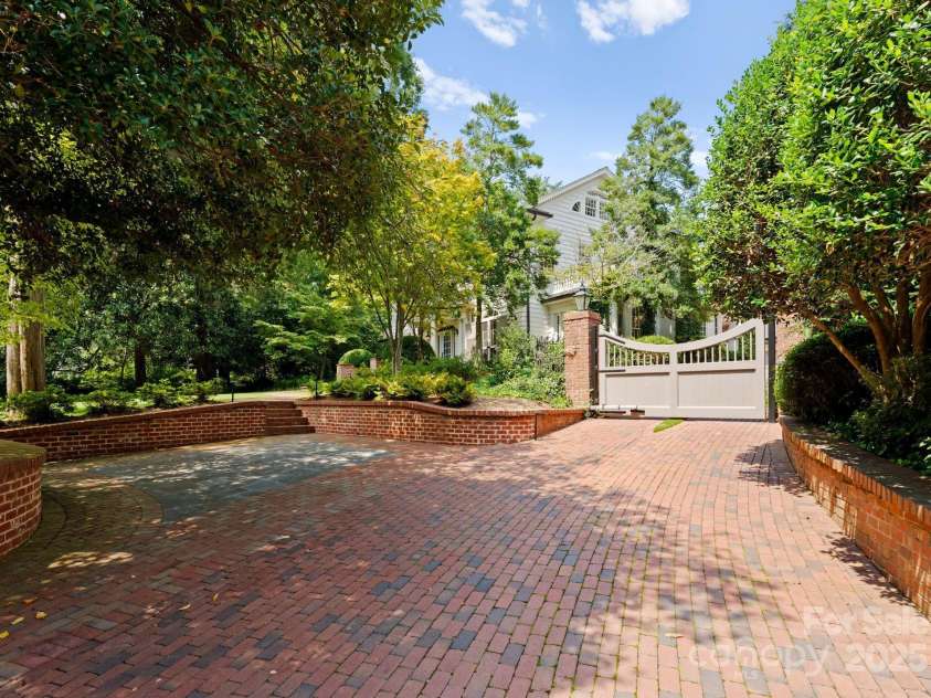 1137 Queens Road, Charlotte, NC 28207.  MLS# CAR4296998, YatesRealty ID 18596. Gated Driveway