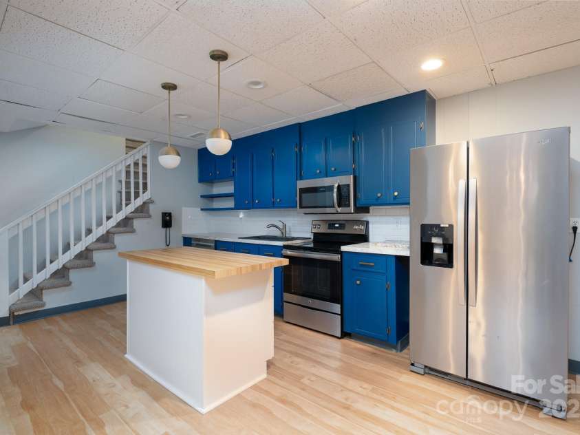 758 Williamsburg Drive, Concord, NC 28025.  MLS# CAR4248248, YatesRealty ID 18597. Basement Kitchen