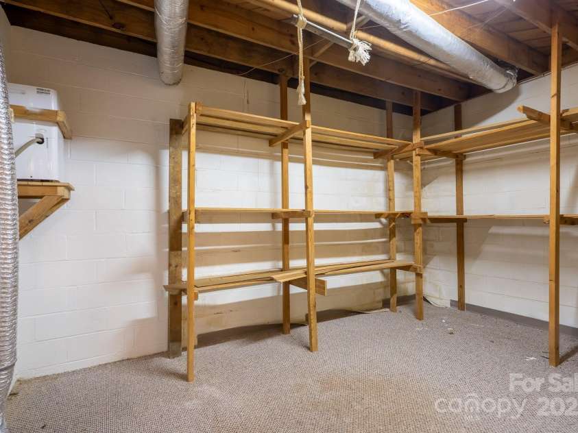 758 Williamsburg Drive, Concord, NC 28025.  MLS# CAR4248248, YatesRealty ID 18597. Basement Storage