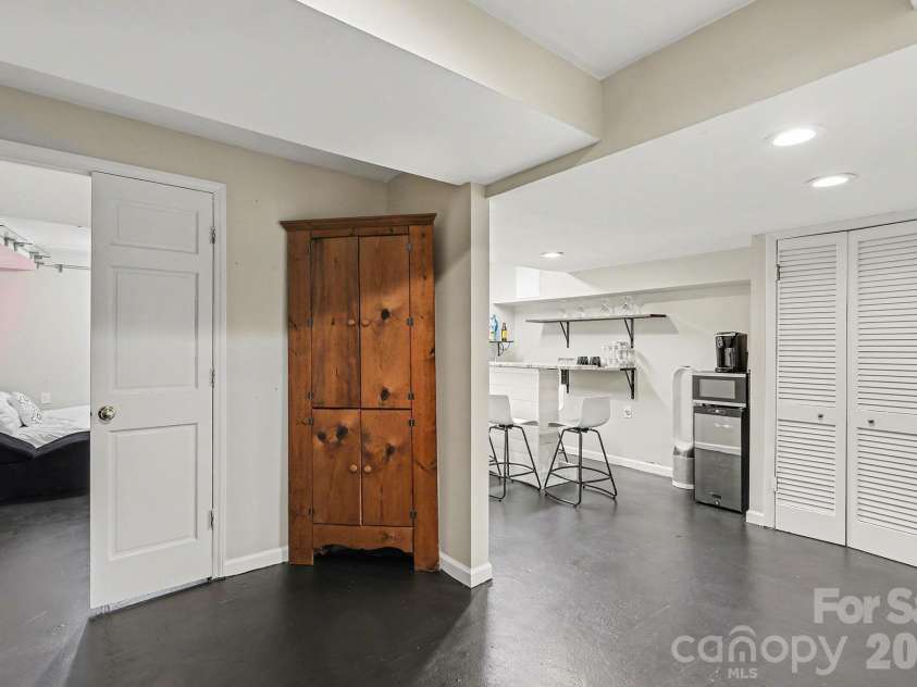123 Old Bell Road, Charlotte, NC 28270.  MLS# CAR4333657, YatesRealty ID 18610. View into the 4th bedroom with a double door entry in the lower level and your kitchenette.