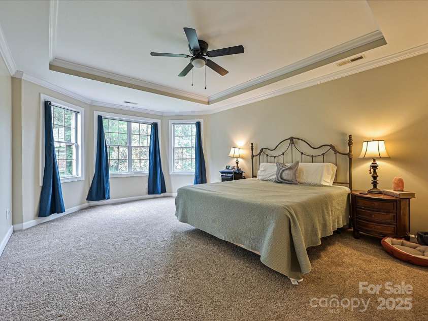 410 Deer Brush Lane, Waxhaw, NC 28173.  MLS# CAR4258859, YatesRealty ID 18616. Oversized Primary Bedroom with tray ceiling