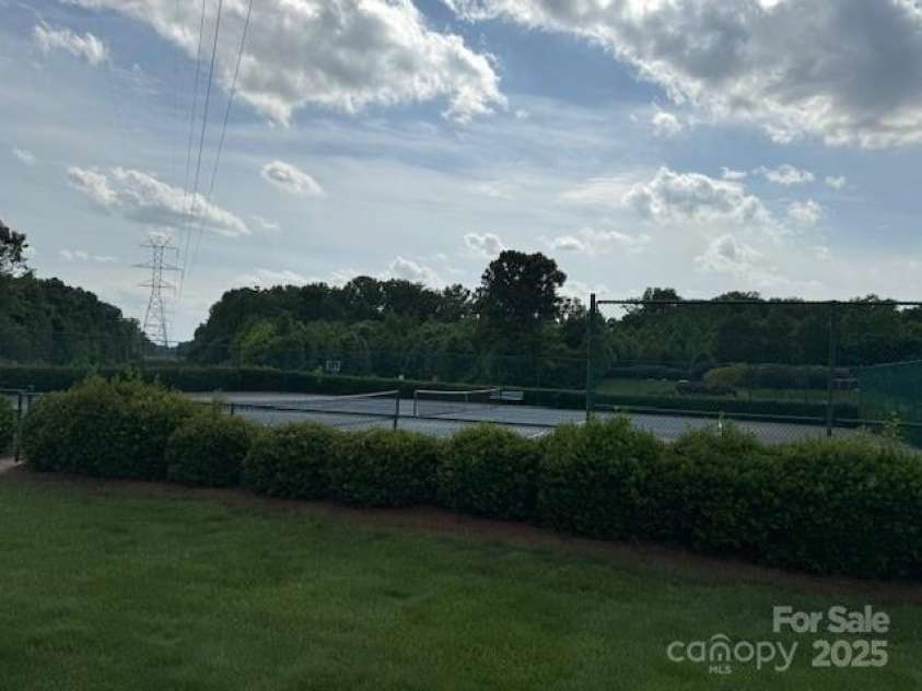 410 Deer Brush Lane, Waxhaw, NC 28173.  MLS# CAR4258859, YatesRealty ID 18616. Tennis courts