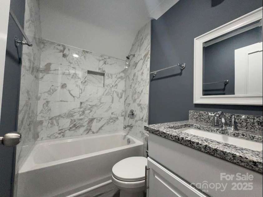 7310 Yorkville Court, Charlotte, NC 28273.  MLS# CAR4232395, YatesRealty ID 1862. Bathroom on the second floor