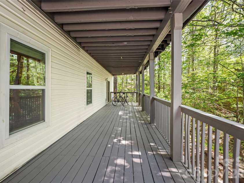 1801 Riverview Court, Hendersonville, NC 28739.  MLS# CAR4373353, YatesRealty ID 18626. Covered Deck-Lower Level
