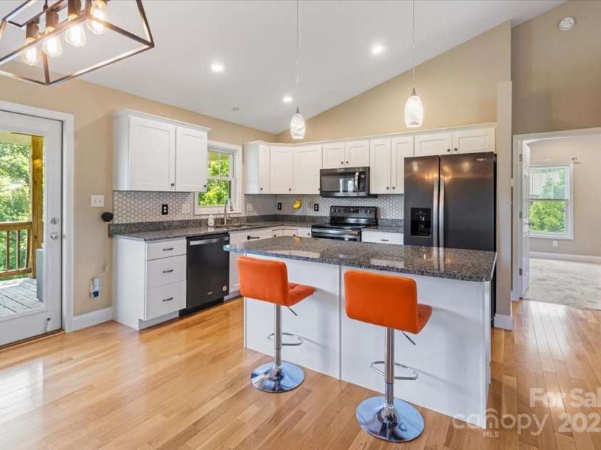 39 Curtis Miles Road, Alexander, NC 28701.  MLS# CAR4266171, YatesRealty ID 18633. Spacious Island/Breakfast Bar