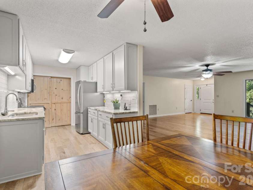 56 Cardinal Circle, Tryon, NC 28782.  MLS# CAR4363971, YatesRealty ID 18634. 