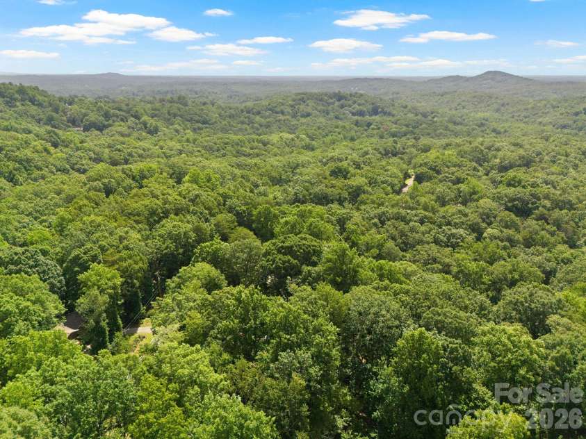 56 Cardinal Circle, Tryon, NC 28782.  MLS# CAR4363971, YatesRealty ID 18634. 