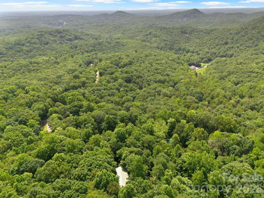 56 Cardinal Circle, Tryon, NC 28782.  MLS# CAR4363971, YatesRealty ID 18634. 