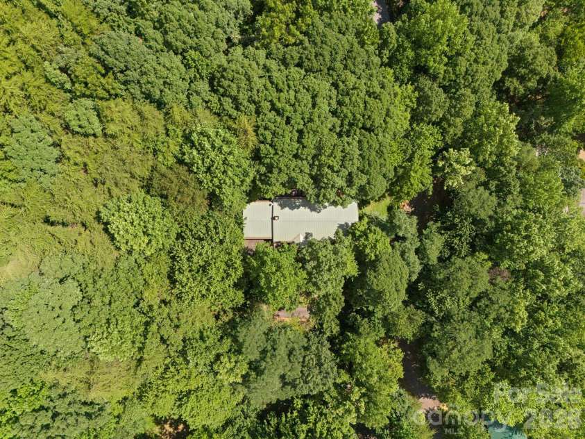 56 Cardinal Circle, Tryon, NC 28782.  MLS# CAR4363971, YatesRealty ID 18634. 