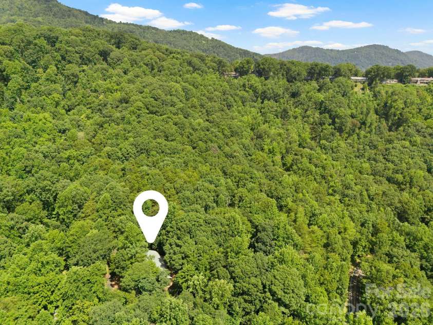 56 Cardinal Circle, Tryon, NC 28782.  MLS# CAR4363971, YatesRealty ID 18634. 