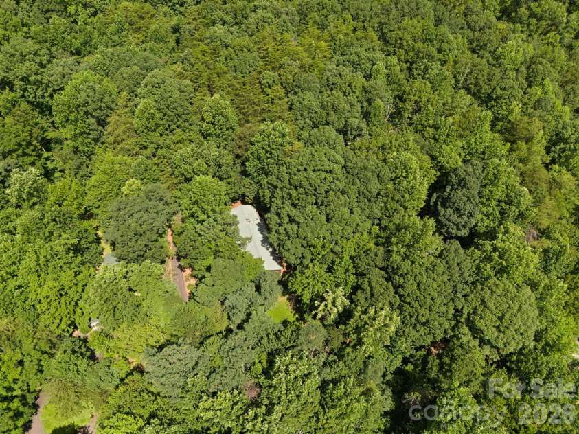 56 Cardinal Circle, Tryon, NC 28782.  MLS# CAR4363971, YatesRealty ID 18634. 