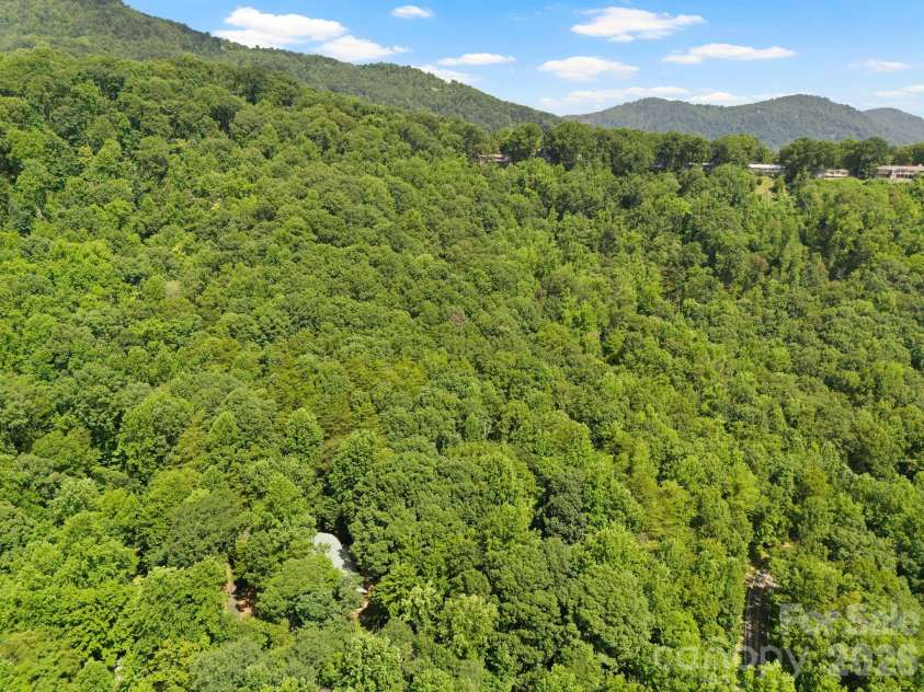 56 Cardinal Circle, Tryon, NC 28782.  MLS# CAR4363971, YatesRealty ID 18634. 