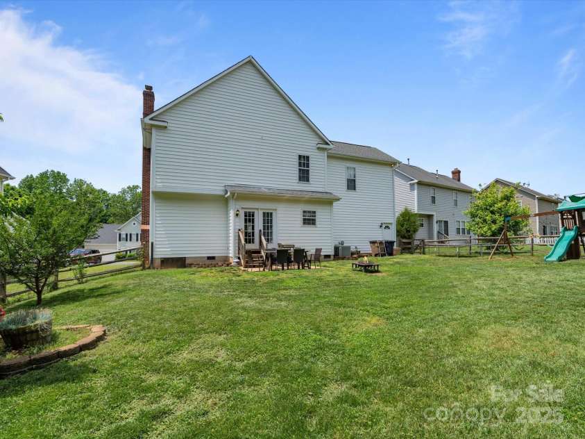 5535 Whispering Wind Lane, Indian Trail, NC 28079.  MLS# CAR4137462, YatesRealty ID 18635. Back of Home