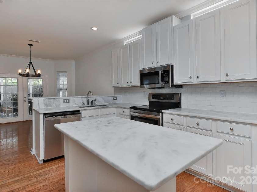 1037 Hammond Drive, Matthews, NC 28104.  MLS# CAR4246179, YatesRealty ID 18639. 