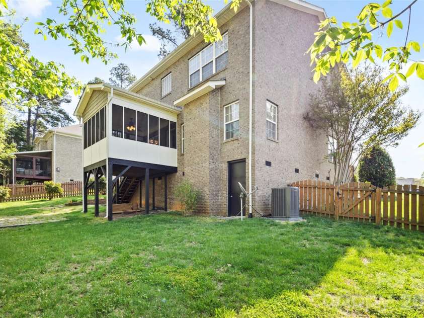 7355 Drury Lane, Denver, NC 28037.  MLS# CAR4365592, YatesRealty ID 18644. Backyard access and screened outdoor living