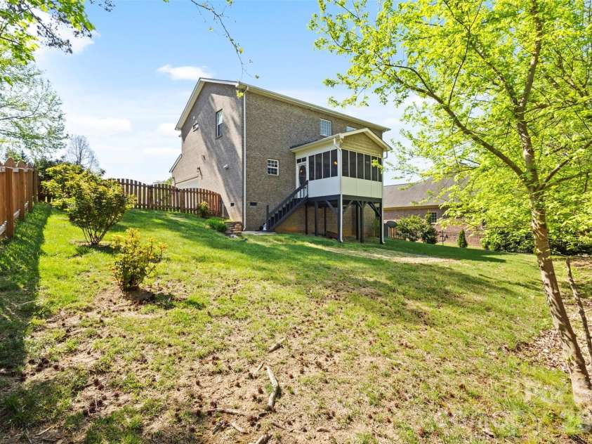 7355 Drury Lane, Denver, NC 28037.  MLS# CAR4365592, YatesRealty ID 18644. Large backyard with Screened porch 