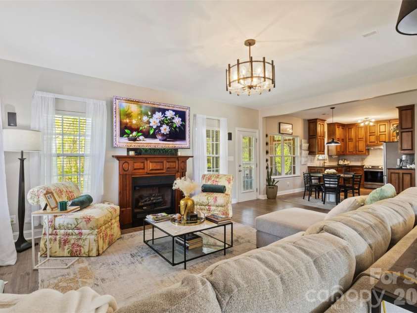 7355 Drury Lane, Denver, NC 28037.  MLS# CAR4365592, YatesRealty ID 18644. Large windows while warming at your fireplace 