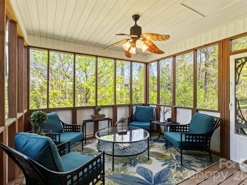 7355 Drury Lane, Denver, NC 28037.  MLS# CAR4365592, YatesRealty ID 18644. Private screen porch with wooded views 