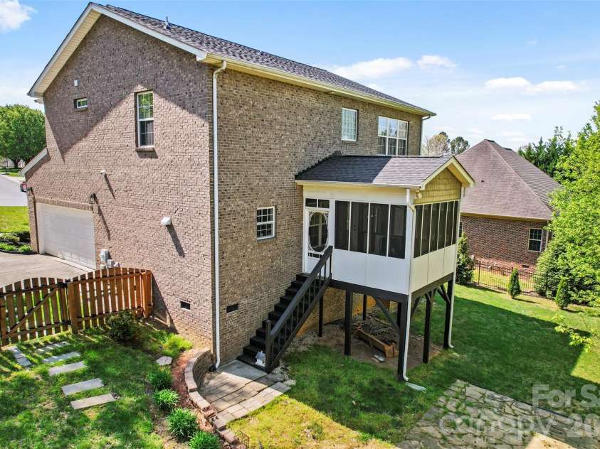 7355 Drury Lane, Denver, NC 28037.  MLS# CAR4365592, YatesRealty ID 18644. Rear exterior with elevated screened porch