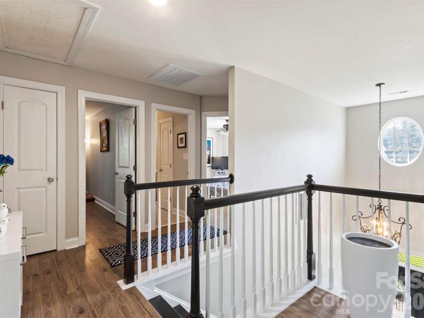 7355 Drury Lane, Denver, NC 28037.  MLS# CAR4365592, YatesRealty ID 18644. Upstairs looking over the railing 