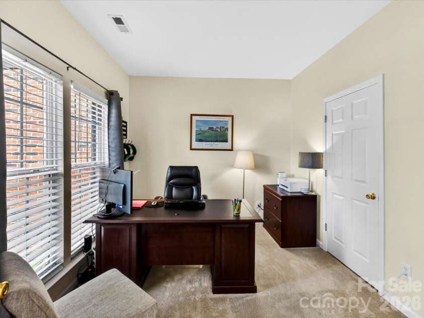 4101 Saint Joseph Drive, Indian Trail, NC 28079.  MLS# CAR4374689, YatesRealty ID 18648. Office on main level connected to half bath