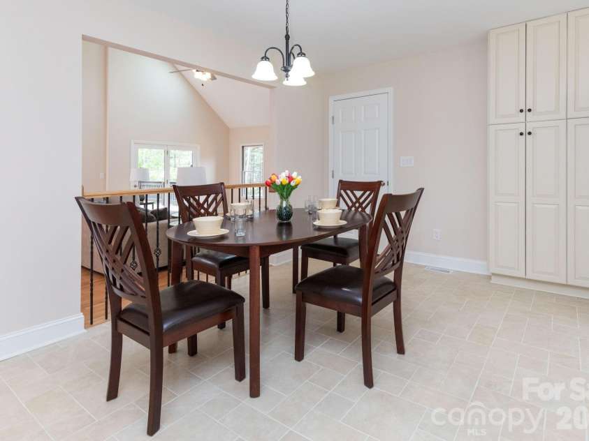 68 Sigmon Road, Fletcher, NC 28732.  MLS# CAR4336800, YatesRealty ID 18650. Casual eat in kitchen area with open sightlines to the living space—ideal for everyday meals and entertaining.